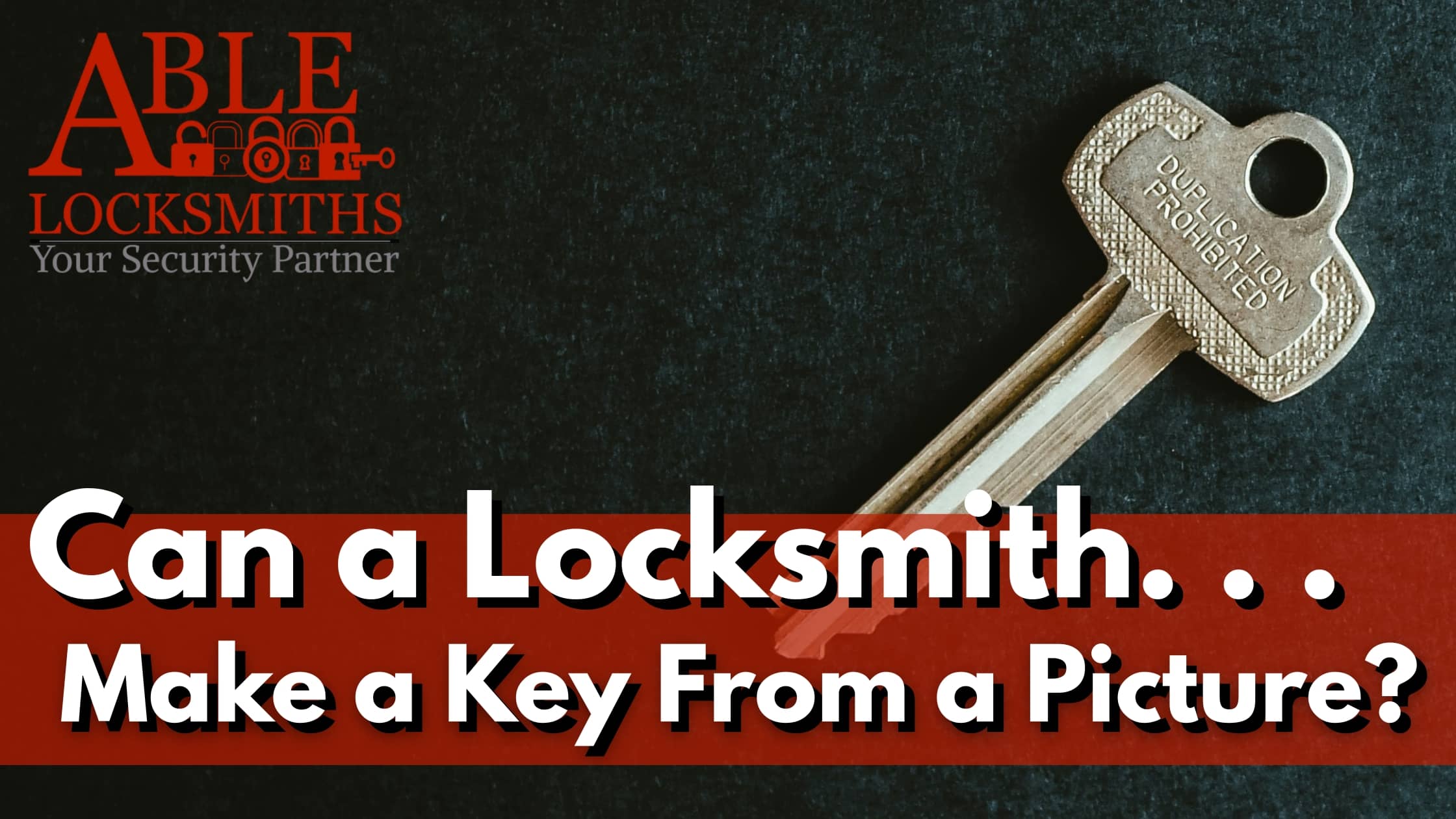 can-a-locksmith-make-a-key-from-a-picture A key labelled, "Duplication Prohibited," lies flat on a dark surface. This image would be perfect for cutting a key from an image; however, most locksmiths won't do this. Read the blog post to find out why.
