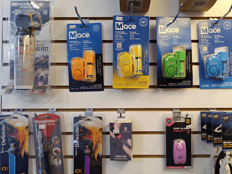A sample of the self defense and tactical gear available at Able Locksmiths in Frederick MD, including mace, bear spray, and a panic alarm. 